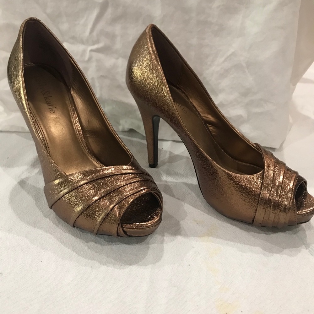 Gently used Shimmering Bronze heels with hidden platform - so comfortabl…